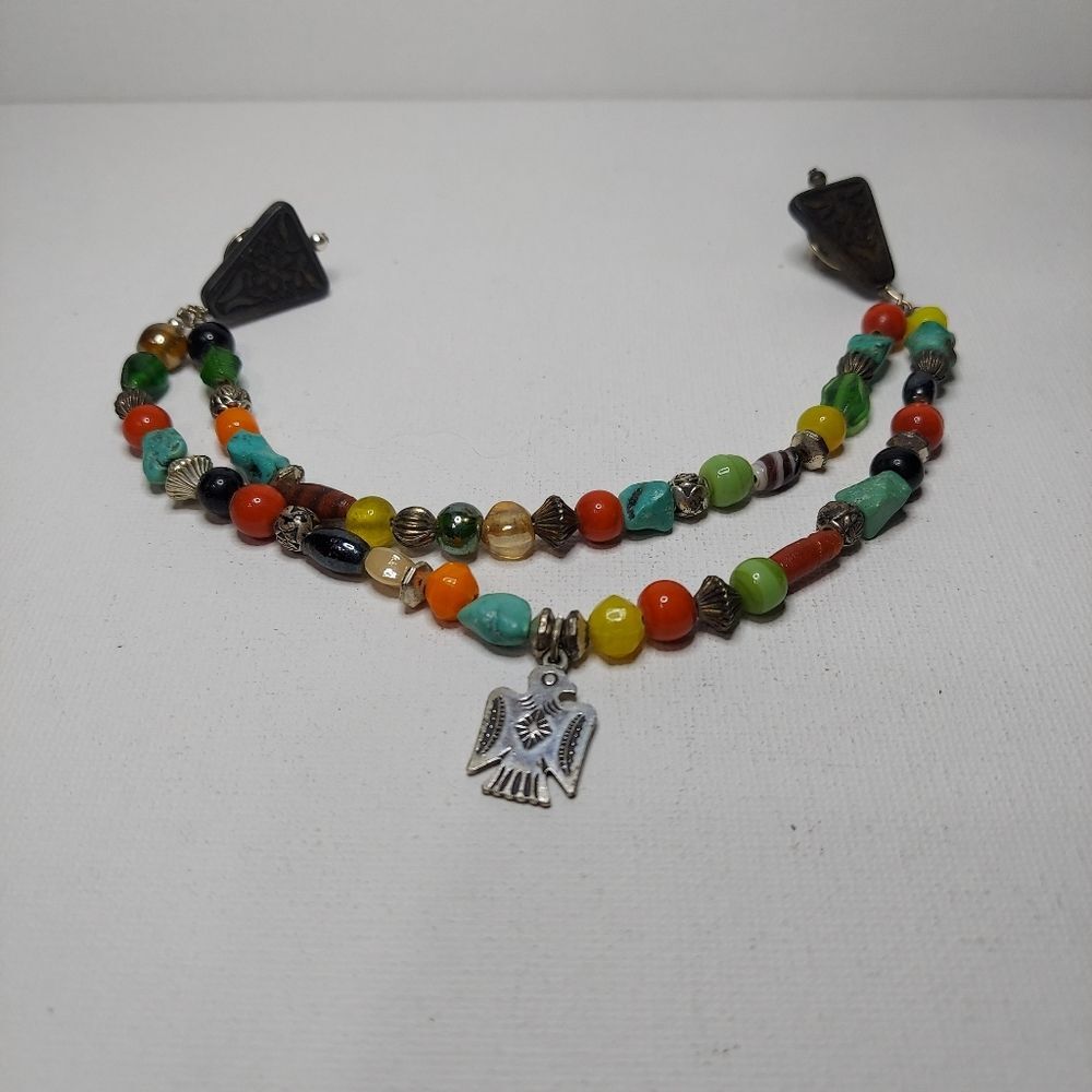 Sweater holder various color beads w/Thunderbird charm